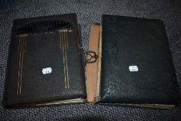 Two photograph albums containing a good quantity of antique photographs.