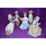 Five Nao figurines, Girl carrying Dove, Girl with Parasol, Girl carrying Cake, Girl carrying