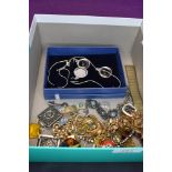 A selection of costume jewellery including brooches pendant, earrings etc