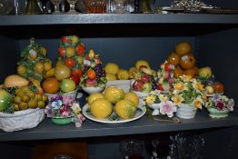 A selection of ceramic model fruit baskets and similar floral examples mostly from Portugal or