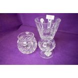 Two clear cut crystal glass vases by Waterford crystal a Marquis vase and similar tall stemmed