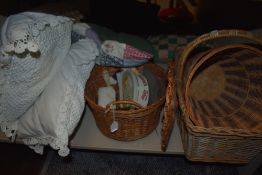 A selection of baskets,haberdashery and cushions.