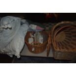 A selection of baskets,haberdashery and cushions.