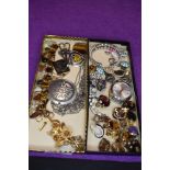 A selection of costume jewellery including polished stone bracelets, clip earrings, Joyas watch face
