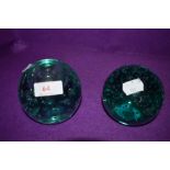 Two aqua green glass paper weights or dumps