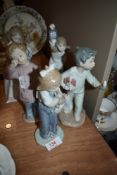 Five Nao Figurines, Girl with Dog carrying Lamp, Girl carrying Dog, Girl carrying Doll, Boy with