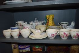 A mixed lot of general ceramics including cups and saucers, jug,tea pot and more.