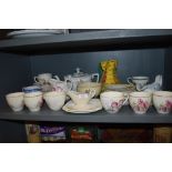 A mixed lot of general ceramics including cups and saucers, jug,tea pot and more.