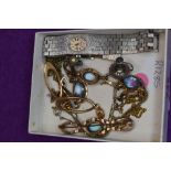 A small selection of costume jewllery including screw back earrings, gold plated loop style stud