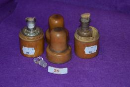 A pair of turned box wood case medical bottles