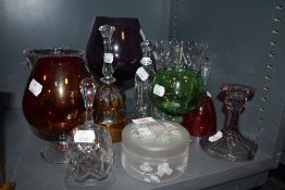 A selection of clear cut and colour art glass including large brandy or wine glass and bells