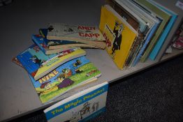 A selection of Andy Capp and Giles cartoon comic books