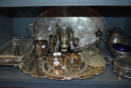 A large lot of plated ware including toast rack,serving dish with blue glass liner, tureen and