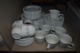 A collection of Staffordshire table ware having pink floral pattern.