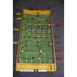 A retro table top football game.