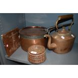 A selection of copper kitchen and bake wares including large lidded stove pan and similar kettle