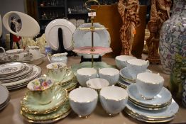 A varied lot of ceramics including cake stand,cups and saucers having floral transfer pattern and