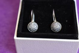 A pair of Pandora silver drop earrings having diamante decoration