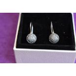 A pair of Pandora silver drop earrings having diamante decoration