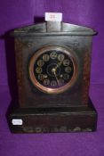 A Victorian gothic mantle clock having slate and marble case with brass and painted face by Mappin