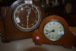 Two vintage wooden mantel clocks, one being Smiths the other an Elliot clock.