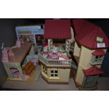 A collection of Sylvanian families toys including house and accessories.