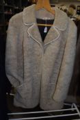 A vintage sheepskin coat,around a medium size.