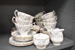 A selection of tea cups and saucers by Aynsley and Crown Royal