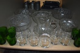 A selection of clear cut and pressed glass wares including large footed Bohemain bowl and Jade green