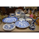 An assortment of blue and white ware including Wedgwood and Johnson Bros.