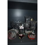 A selection of art glass and clear cut crystal including Caithness paper weight and named glass