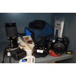 A selection of photography equipment and camera including Canon T70 and EOS 1000F