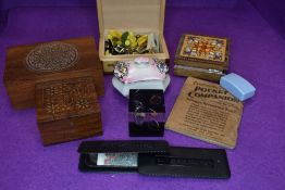 A selection of misc items including lapel pins, small wooden jewellery boxes, Rhodesian coins, key