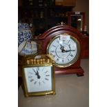 A brass cased carriage clock by Smiths and similar Highlands mantle clock