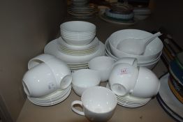 A selection of dinner ware by Maxwell and Williams,including cups,saucers,plates and more.