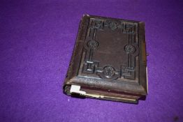 A Victorian leather bound photo album containing local Shap and Kendal interest