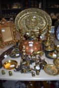 A mixe lot of vintage brass,copper and similar including picture hooks,horse brasses,candle sticks