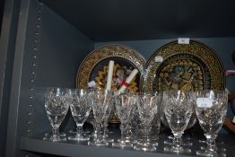 A selection of clear cut crystal glasses including wine sherry and Brandy all stamped for Royal