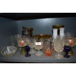 A selection of glass ware including two blue eye baths, and etched drinking glasses.