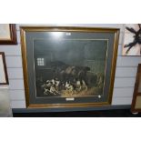 A large framed and glazed print of horse and dogs in stable