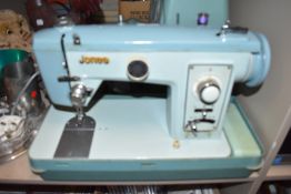 A vintage Jones model C sewing machine.