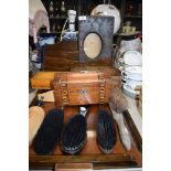 A selection of treen including tray,brushes, letter rack,boxes and more.