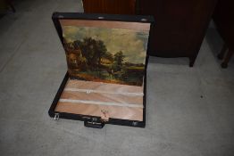 A vintage hard portfolio case, containing Constable's Haywain print