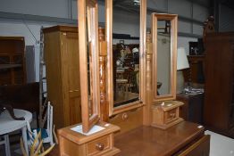 A modern pine dressing table style tri fold mirror with two jewellery drawers