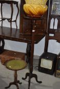 A reproduction mahogany jardiniere stand and majolica jardiniere