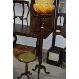 A reproduction mahogany jardiniere stand and majolica jardiniere