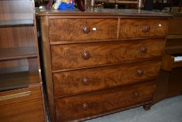 An antique flame mahogany fronted chest of two over three with solid mahogany drawers