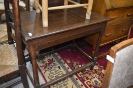 A 19th Century oak occasional table having frieze drawer and part turned frame