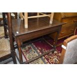 A 19th Century oak occasional table having frieze drawer and part turned frame