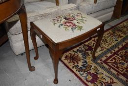 An early 20th Century tapestry footstool